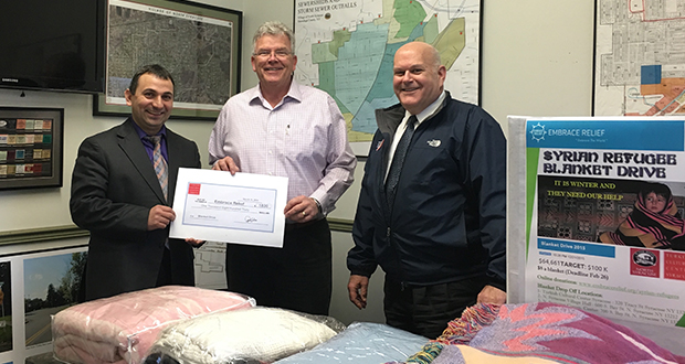 Embrace Relief Collected Blankets for Syrian Refugees within Syracuse Community